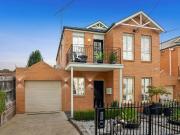 Elegant Townhouse Enjoys the Best of the West and City...