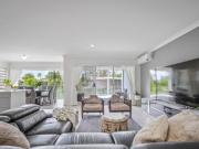 Elegant Waterfront Family Living with Resort Style Pool