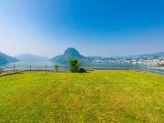 Elegante Wohnung mit Garten mit Blick auf den See