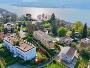 Elegantes Duplex mit privatem Garten in Montagnola,...