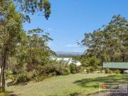 Elevated 1.1 hectares adjoining National Park