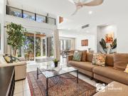 Elevated coastal living with bush and coastal views