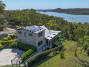 Elevated Coastal Living with Water Views