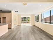 Elevated Family Home with Ocean Glimpses & Strong...