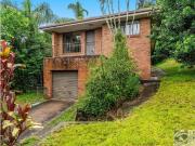 ELEVATED HOME WITH A PEACEFUL OUTLOOK