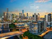 Elevated North East Facing Apartment with City Views!