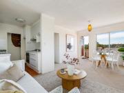 Elevated North Facing Apartment with District Views on...