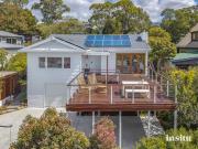 Elevated Privacy, River Views & Versatile Living in...