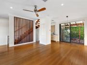 elevated tri level townhouse with leafy outlook