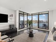 Elevated waterfront living with resort luxury and scenic...