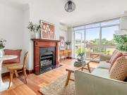 Elwood Elegance Framed by Greenery and Natural Light