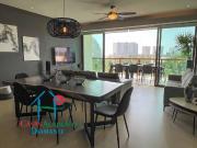 En condominio de playa. Terraza con vista a las albercas