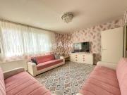 En RDC surélevé T5 rénové 4 chambres et cave