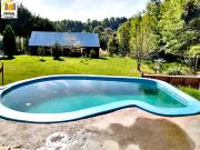 EN VENTA AMPLIA CASA CON CABAÑA Y GALPON EN PARCELA