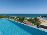 EN VENTA ESTUDIO EN PUERTO MORELOS CON ALBERCA Y RESTAURANTE