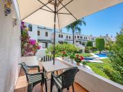 Encantadora casa adosada en Estepona con piscina y tenis