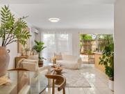 End Unit Privacy Meets Vibrant Coastal Living