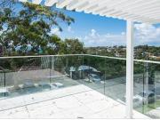 Enjoy a large family home with sweeping ocean views