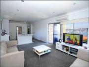 Enjoy sweeping views of Five Dock Bay from every room