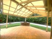 Entertaining at Its Finest with Expansive Pergola