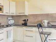 Erdgeschosswohnung mit Terrasse, Gartenanteil und...