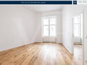Erstbezug: 3 Zimmer Stilaltbau mit Balkon in zentraler Lage