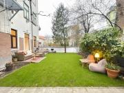 ERSTBEZUG! Künstlerwohnung mit malerischen Garten in Top...