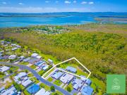 Escape to Your Private Seaside Retreat in Tin Can Bay