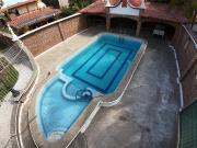 Espectacular Casa de Una Planta con Alberca y Gran Jardín