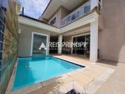 EXCELENTE CASA TRIPLEX COM 4 SUÍTES PARA ALUGAR EM...