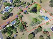 EXCEPTIONAL VIEWS AND VERSATILE LIVING ON EXPANSIVE LAND...