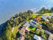 Exceptional waterfront home on 955sqm block