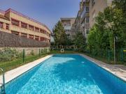 EXCLUSIVA PISO EN URBANIZACION CON JARDIN Y PISCINA