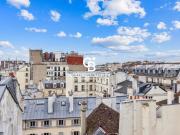 Exclusivité Coldwell Banker Studio mansardé dans le Marais