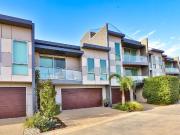 EXECUTIVE RIVERFRONT LIVING AT ITS FINEST