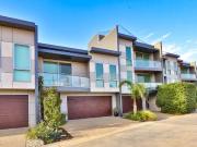 EXECUTIVE RIVERFRONT LIVING AT ITS FINEST