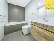 “EXECUTIVE STYLE TWO BEDROOM APARTMENT IN SKYRISE...
