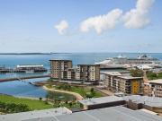 Executive Waterfront Apartment with Balcony, Views & Resort