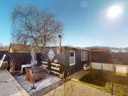 Exklusive Gartenwohnung mit Pool, Kamin und Carport –...