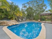 Expansive Family Entertainer With Poolside Living! Expansive Family Entertainer With Poolside Living!