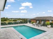 Expansive Luxury Framed by Rolling Views