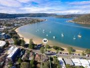 Exquisite beachside offering with rare development...