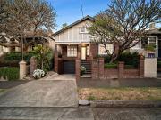 Exquisitely renovated home with lush garden and triple...