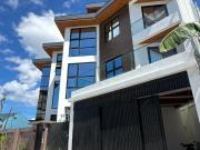 EXTRA ELEGANT MODERN HOUSE AND LOT IN GREENWOODS...