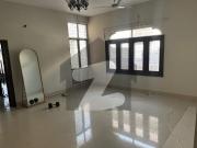 F11 double storey house 5 beds 2 kitchens tiled floor...