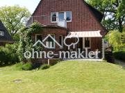 Familienfreundliche Rotklinkervilla auf großem...