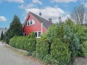 Familienfreundliches Holzständerwerkhaus mit Carport und...