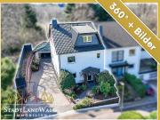 Familienidyll in bevorzugter Lage Großzügige DHH mit...