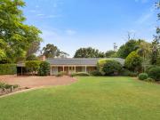 Family Friendly 1 Acre Estate in Desirable Location