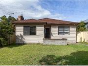 FAMILY HOME IN CENTRAL LOCATION WITH REAR CARPORT ACCESS